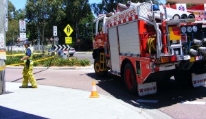 NSW Fire Brigade, alongside Coles at Budgewoi, enforcing street closure on the last day